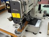 a sewing machine that is sitting on a table