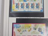 two framed pictures of cartoon characters on the wall