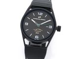 the watch is black and has a black face and black hands