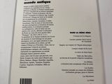 the back cover of a book with a picture of a cat sitting on top of it