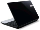 a black laptop computer sitting on a white surface