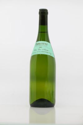 a bottle of wine that is sitting on a table