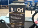 a picture of a machine that is sitting in a warehouse