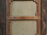 an old picture of a window with a wooden frame on it