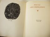 an open book with a drawing of a tree on it