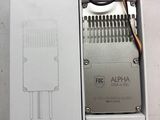 une boîte ouverte contenant un appareil électronique blanc