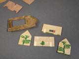 several pieces of cardboard are laid out on a table