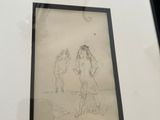 a picture of a drawing of a man and a woman on the beach