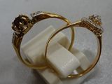 two rings that are sitting on top of each other
