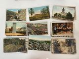 many old postcards on the wall of a room