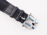 a close up of a black leather belt with a silver buckle
