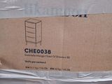 packaging of a cardboard box with a closed drawer on top of it