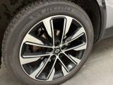 a close up view of a tire on a car
