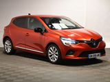a red car parked in a garage with a checkered floor