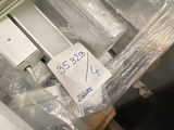 a pile of electronic equipment wrapped up in plastic