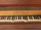 a piano that is sitting on a table