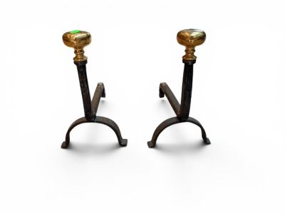 pair of antique brass candlesticks on cast iron bases