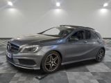 the mercedes b - class is parked on a checkered floor