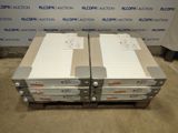 two boxes of white paper are stacked on top of a pallet