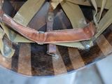 a close up of a helmet on a table