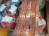 many different types of wires in a box on the floor