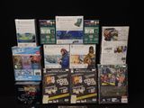 a lot of nintendo wii games on the table