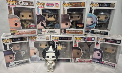de nombreuses figurines Pop Vinyl exposées dans la boîte