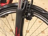 a close up view of a bicycle with a red frame