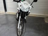 a motorcycle that is parked in a garage