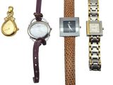 three different watches and a gold watch on a white background