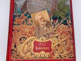 un vieux livre sur lequel figure l'image d'un homme et d'un globe terrestre