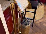 a music stand in the corner of a kitchen