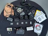 a lot of electronics that are on the table