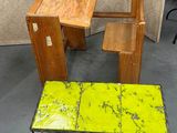 a small table and a small chair in a room