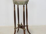 an image of a small table with two legs and a tray on top of it