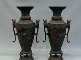 pair of antique bronze vases with handles and handles