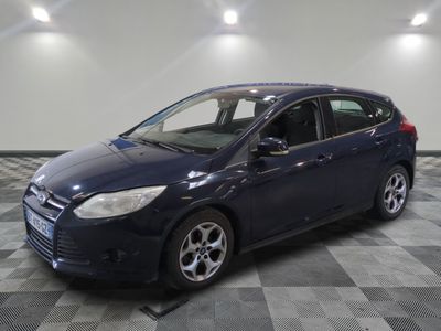 2012 ford focus in a showroom with a checkered floor