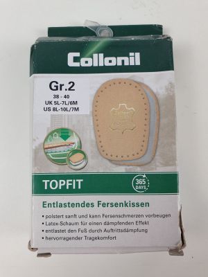 the packaging of a pair of foot pads is shown on a white surface