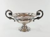 an antique silver plated bowl with handles and handles on a white background