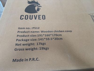a cardboard box with a picture of a chicken on it