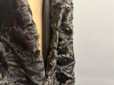 an image of a woman ' s coat with a fur collar