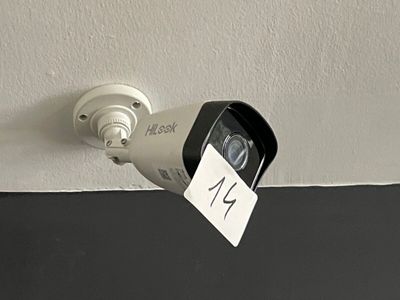an image of a security camera mounted on a wall