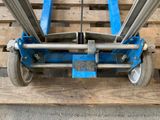 a dolly that is sitting on top of a pallet
