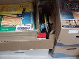 many books in the boxes on the floor