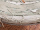 a piece of fabric that has been torn off of a chair
