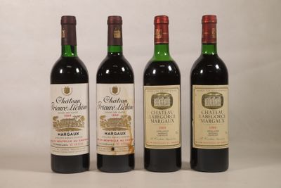 trois bouteilles de vin sont alignées sur une surface blanche