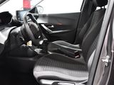 a picture of the interior of a car with a steering wheel