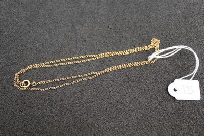 a close up of a necklace with a tag attached to it