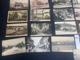 several old black and white photographs of a city and a street