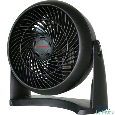 un ventilateur noir posé sur un pied